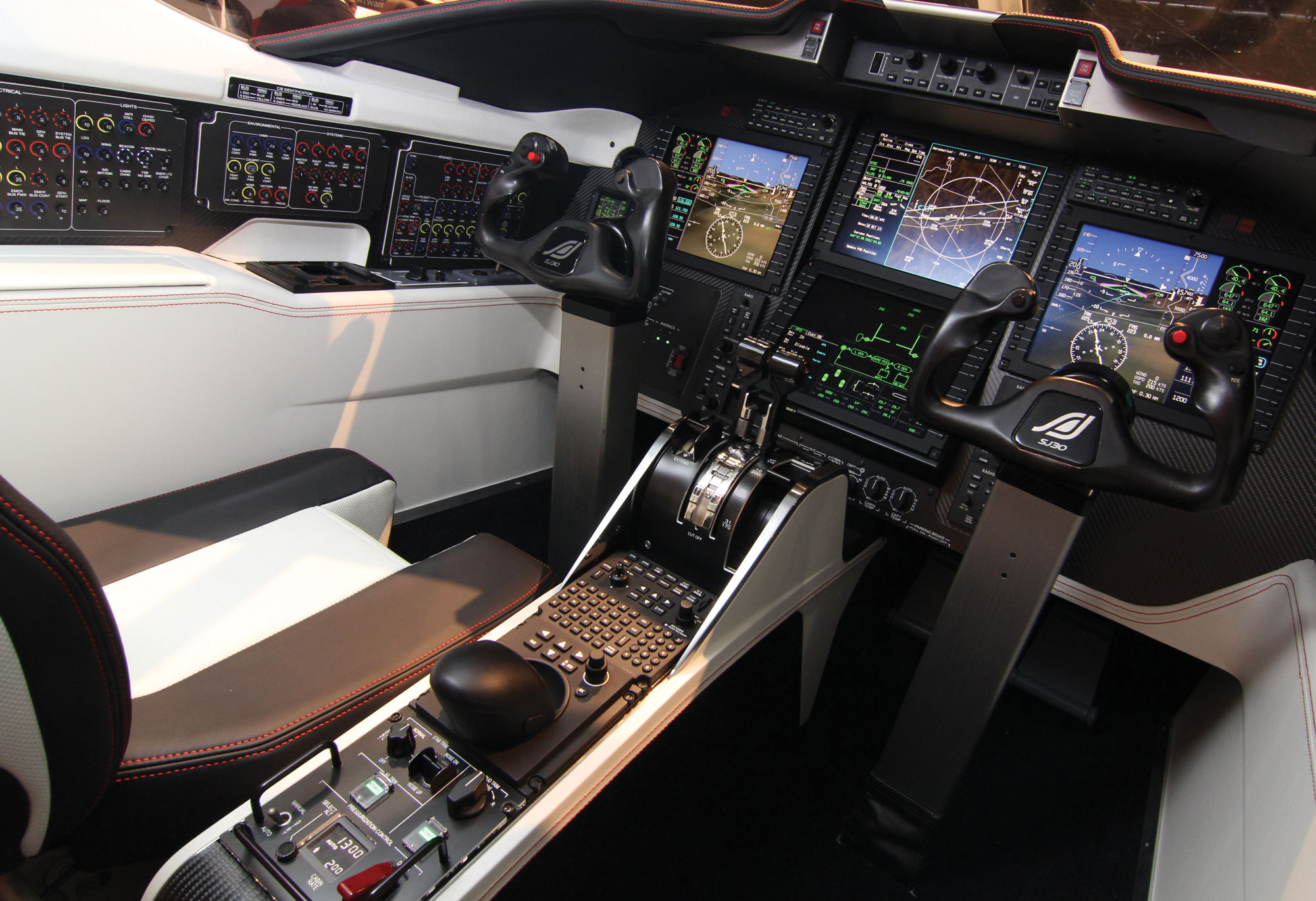 AIN Cockpit Pic NBAA 2014.jpg